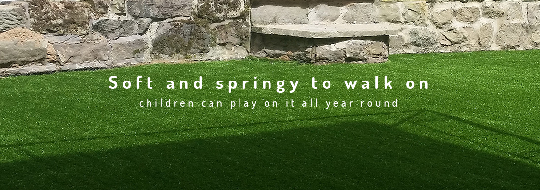 artificial lawn fitting showing a fake grass installation.